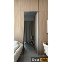 Veneer Doors with Classic Silver Anodized Profiles – Developer-Grade UAE Supply
